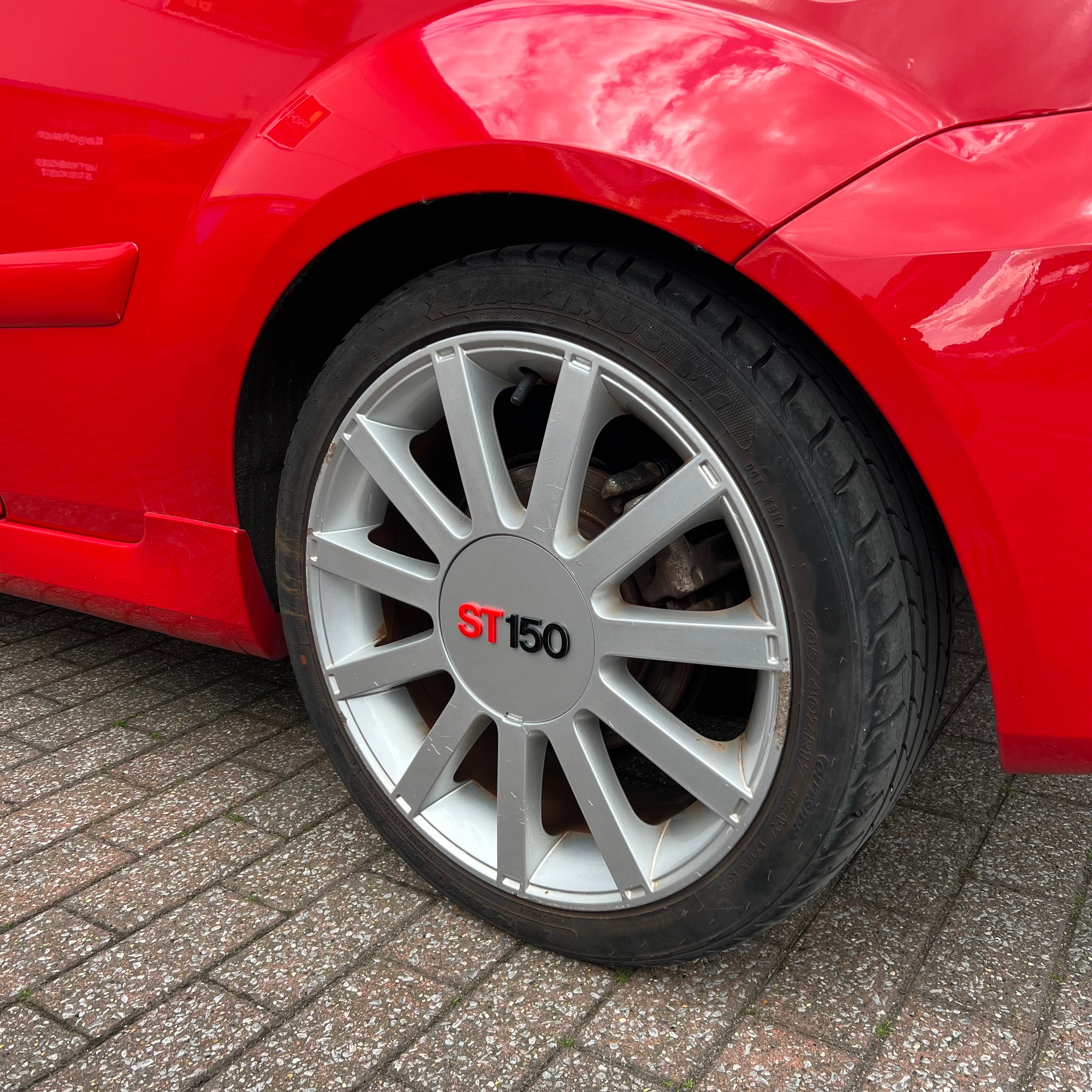 Proform Mk6 Fiesta ST150 Wheel Centre Caps -Painted Moondust Silver with ST150 Text