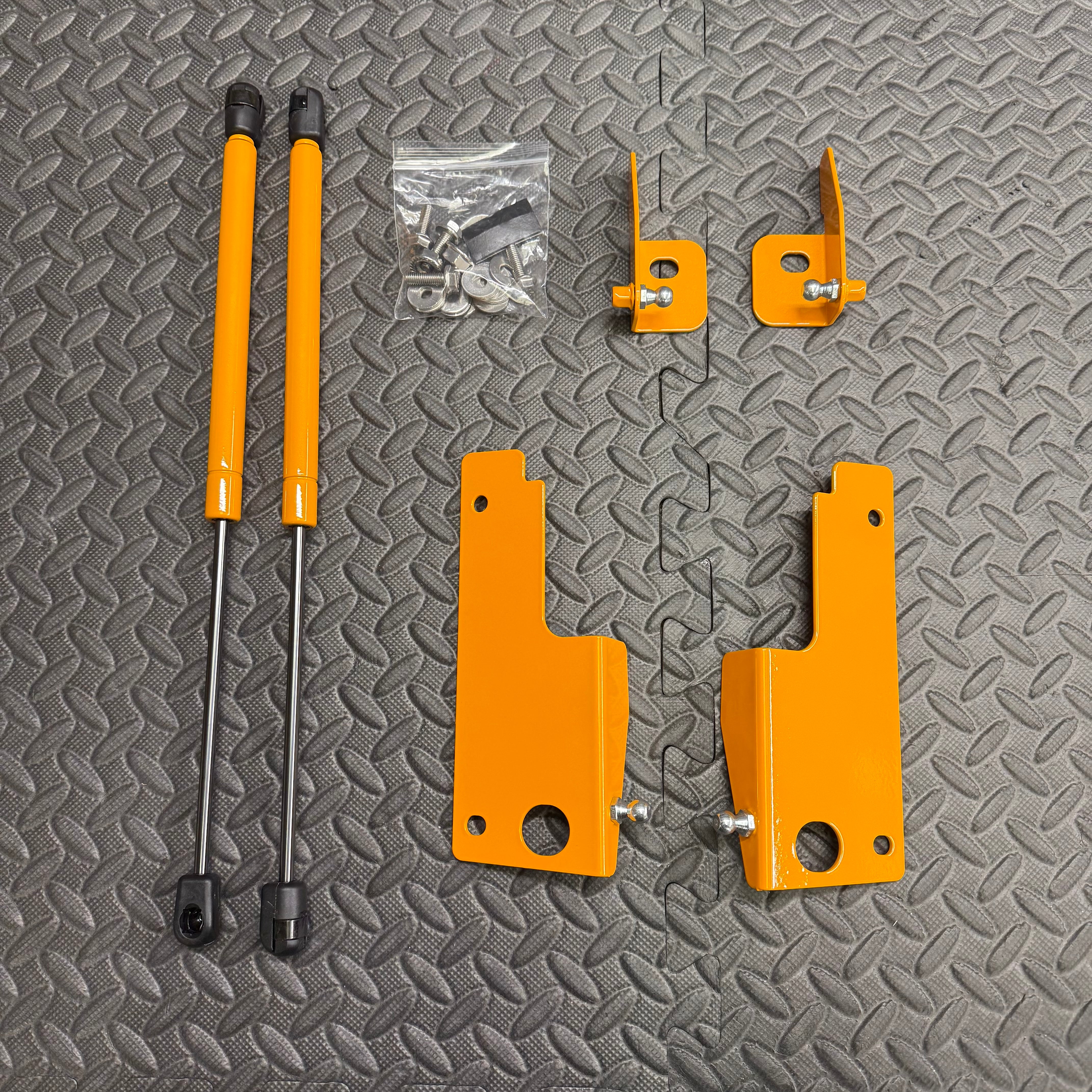 Mk4/4.5 Focus inc ST Gas Strut Bonnet Lifters - Painted Orange Fury